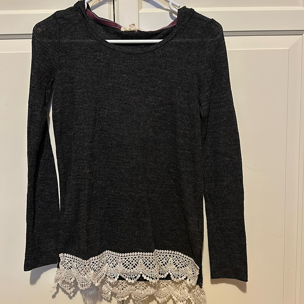Gray hooded women’s sweater